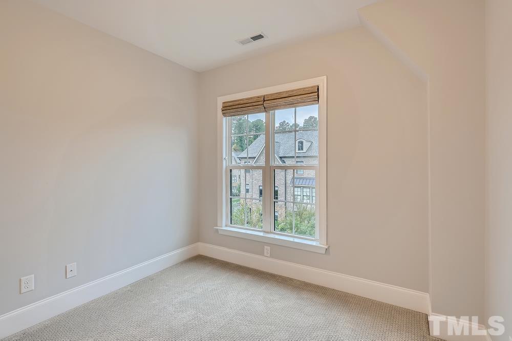 1604 Bowery Drive Raleigh, NC 27607 - Photo 19 of 28 an empty room with a window