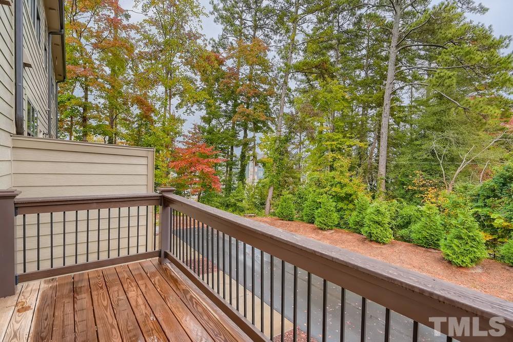 1604 Bowery Drive Raleigh, NC 27607 - Photo 26 of 28 a view of a balcony with wooden fence