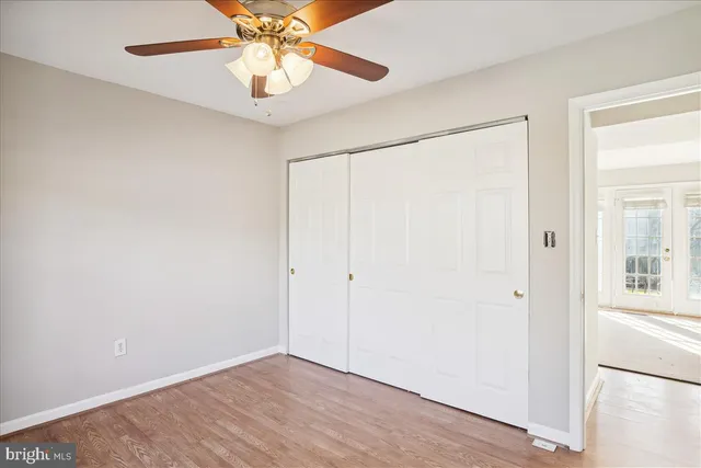 a swimming pool with outdoor seating and yard
