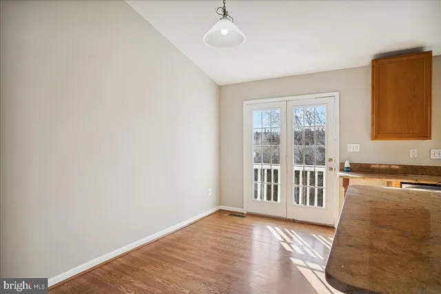 a view of livingroom with furniture wooden floor and window