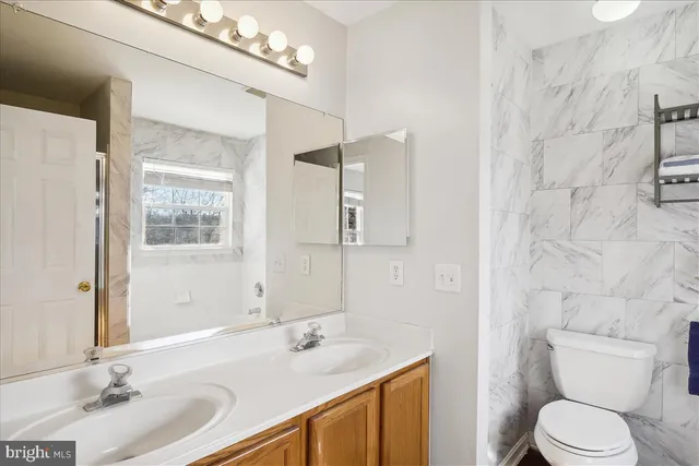 a view of an swimming pool with an outdoor space and seating area