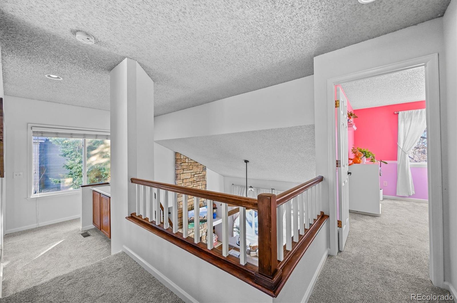 2249 Weatherstone Circle Highlands Ranch, CO 80126 - Photo 24 of 46 a view of an entryway with a window