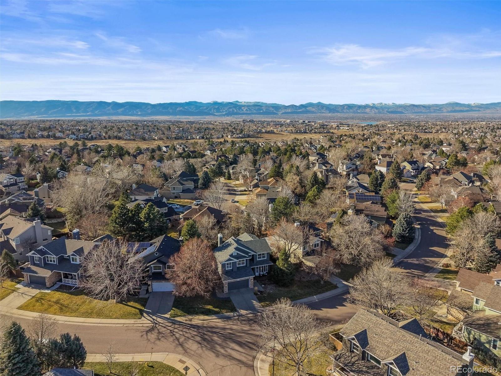 2249 Weatherstone Circle Highlands Ranch, CO 80126 - Photo 43 of 46 a view of lake and mountain