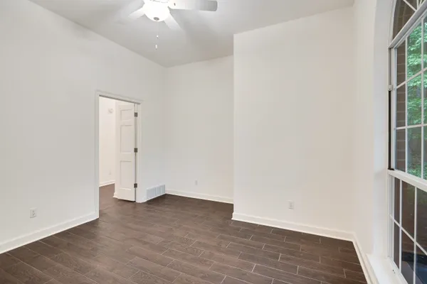 a bathroom with a sink toilet and mirror