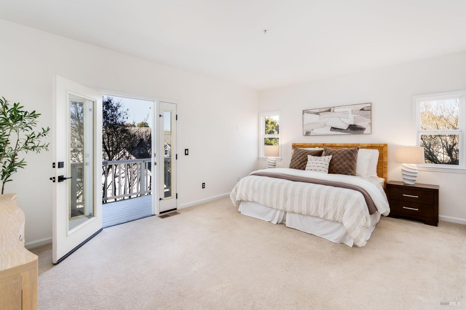 384 Arabian Way Healdsburg, CA 95448 - Photo 20 of 65 Large primary bedroom with natural light pouring in.