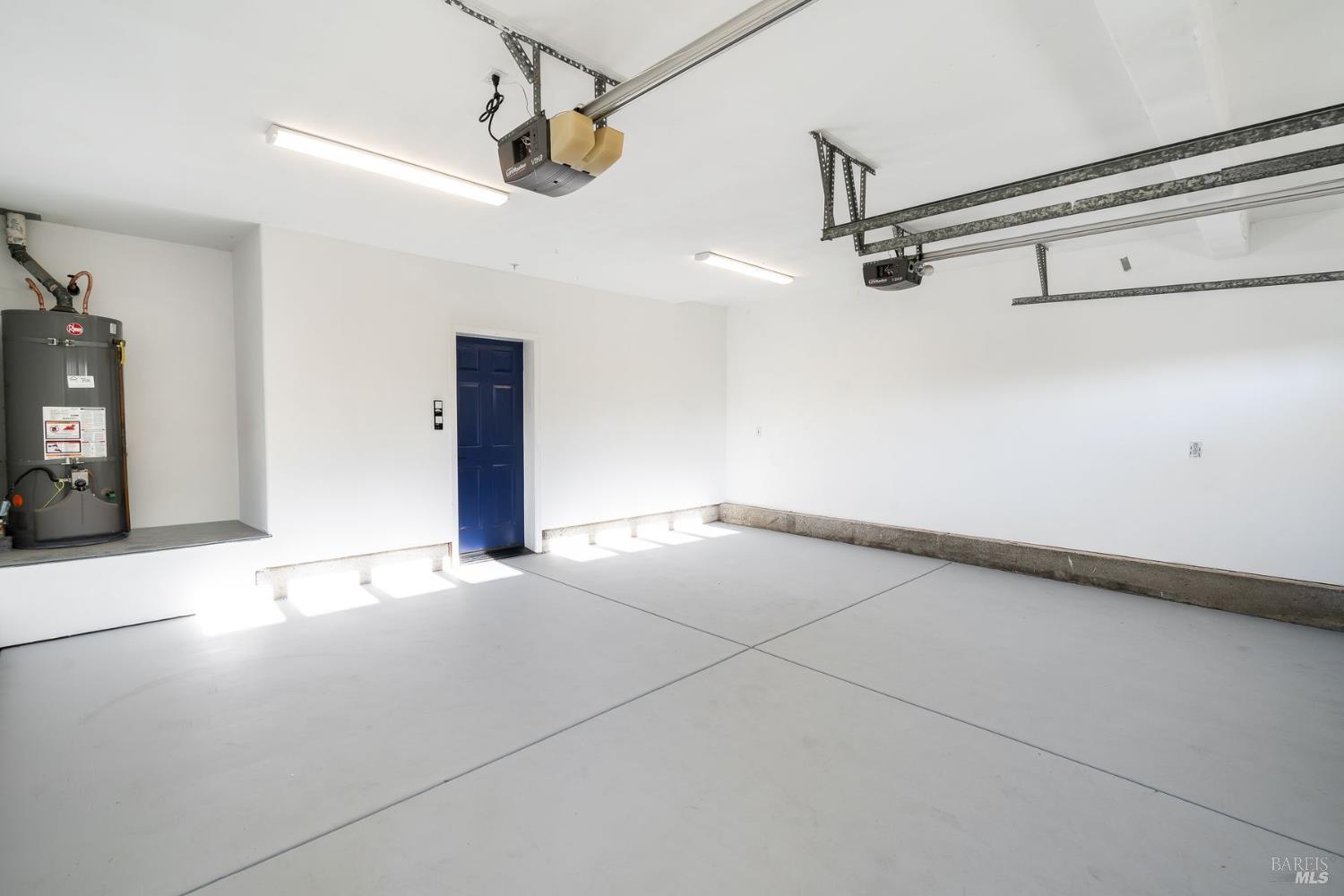 384 Arabian Way Healdsburg, CA 95448 - Photo 40 of 65 Well lit and versatile 2-car garage