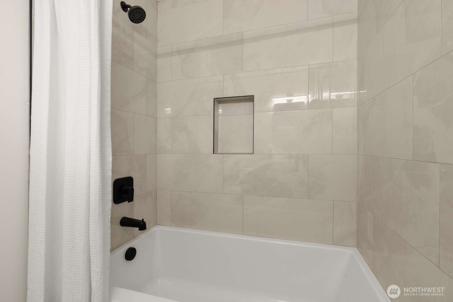 10811 Northeast 154th Court Bothell, WA 98011 - Photo 12 of 28 a bathroom with a bathtub