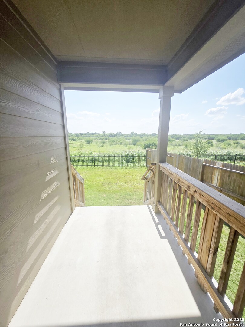 437 Middle Grn Loop Floresville, TX 78114 - Photo 21 of 25 a view of balcony with ocean
