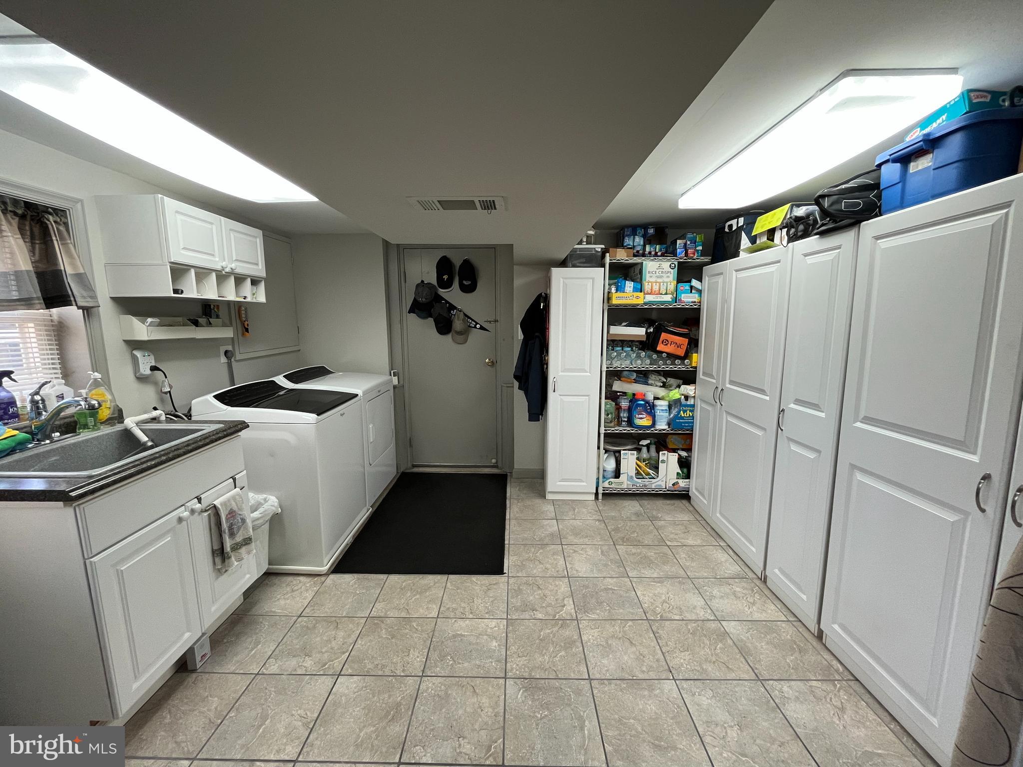 441 Hightop Road West Chester, PA 19380 - Photo 25 of 35 Large laundry area/mudroom with extra storage