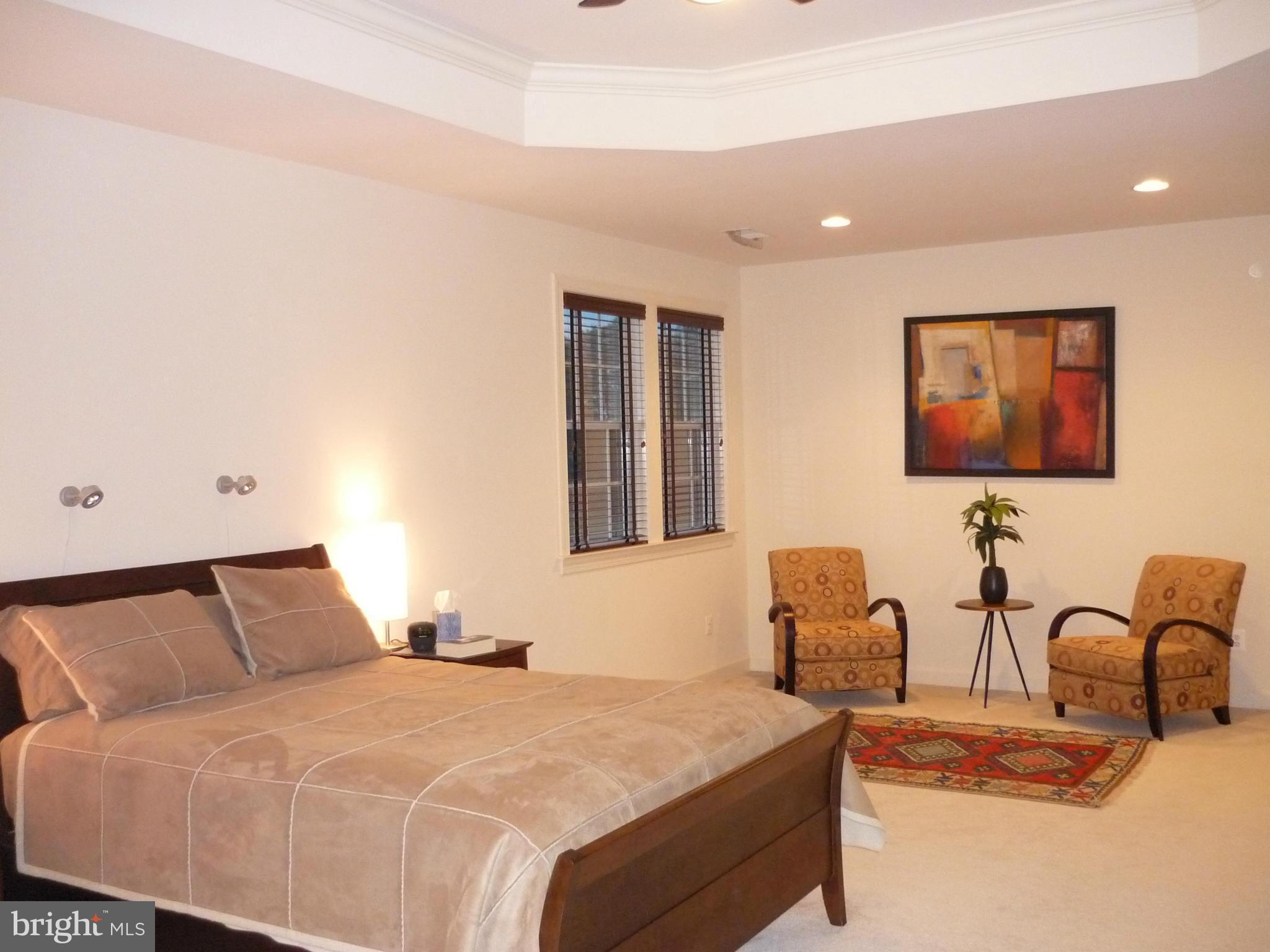 7258 Joshua Tree Circle Warrenton, VA 20187 - Photo 14 of 16 a bedroom with a bed and furniture