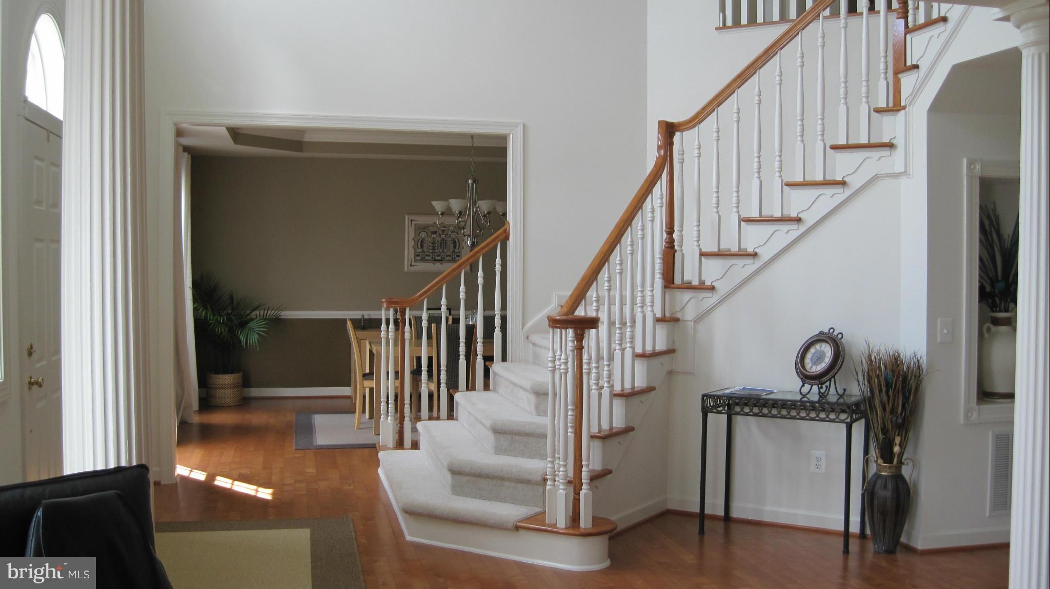 7258 Joshua Tree Circle Warrenton, VA 20187 - Photo 6 of 16 a view of entryway and hall with wooden floor