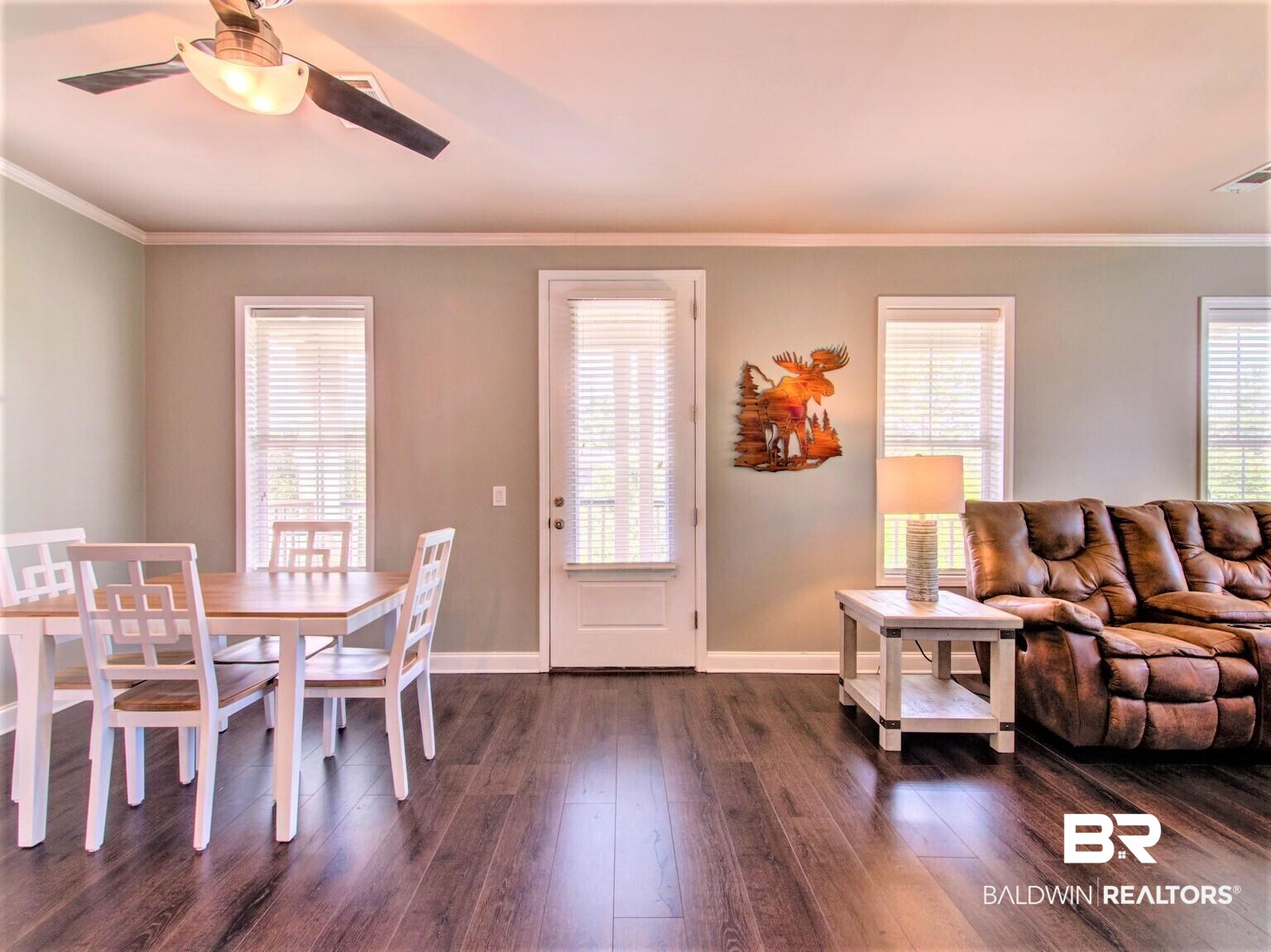 25806 Pollard Road, Unit 210 Daphne, AL 36526 - Photo 13 of 25 Living Rm out to balcony