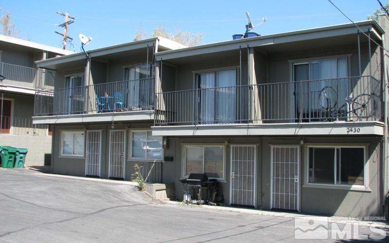 2430 Sutro Street, Unit 4 Reno, NV 89512 - Photo 1 of 6 a view of a house with a barbeque on the road