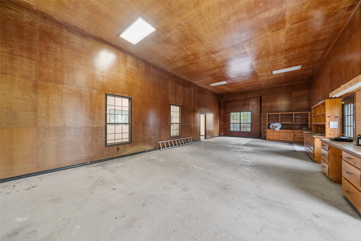 186 Lake Road Huntsville, TX 77320 - Photo 27 of 48 a view of a livingroom with a fireplace