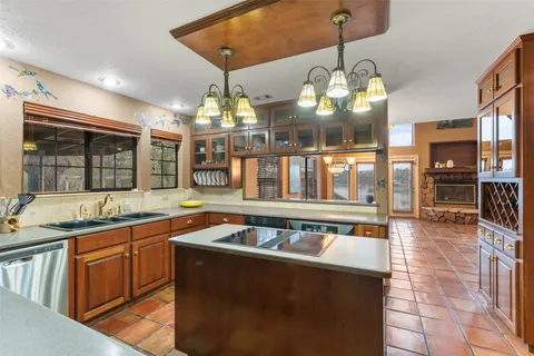 a kitchen with lots of counter space and a sink