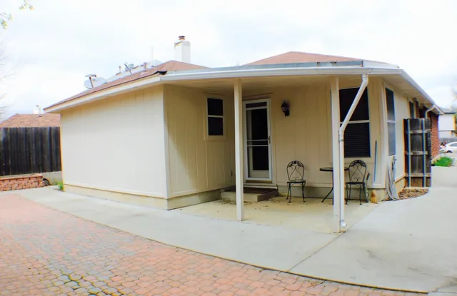 a view of house with patio