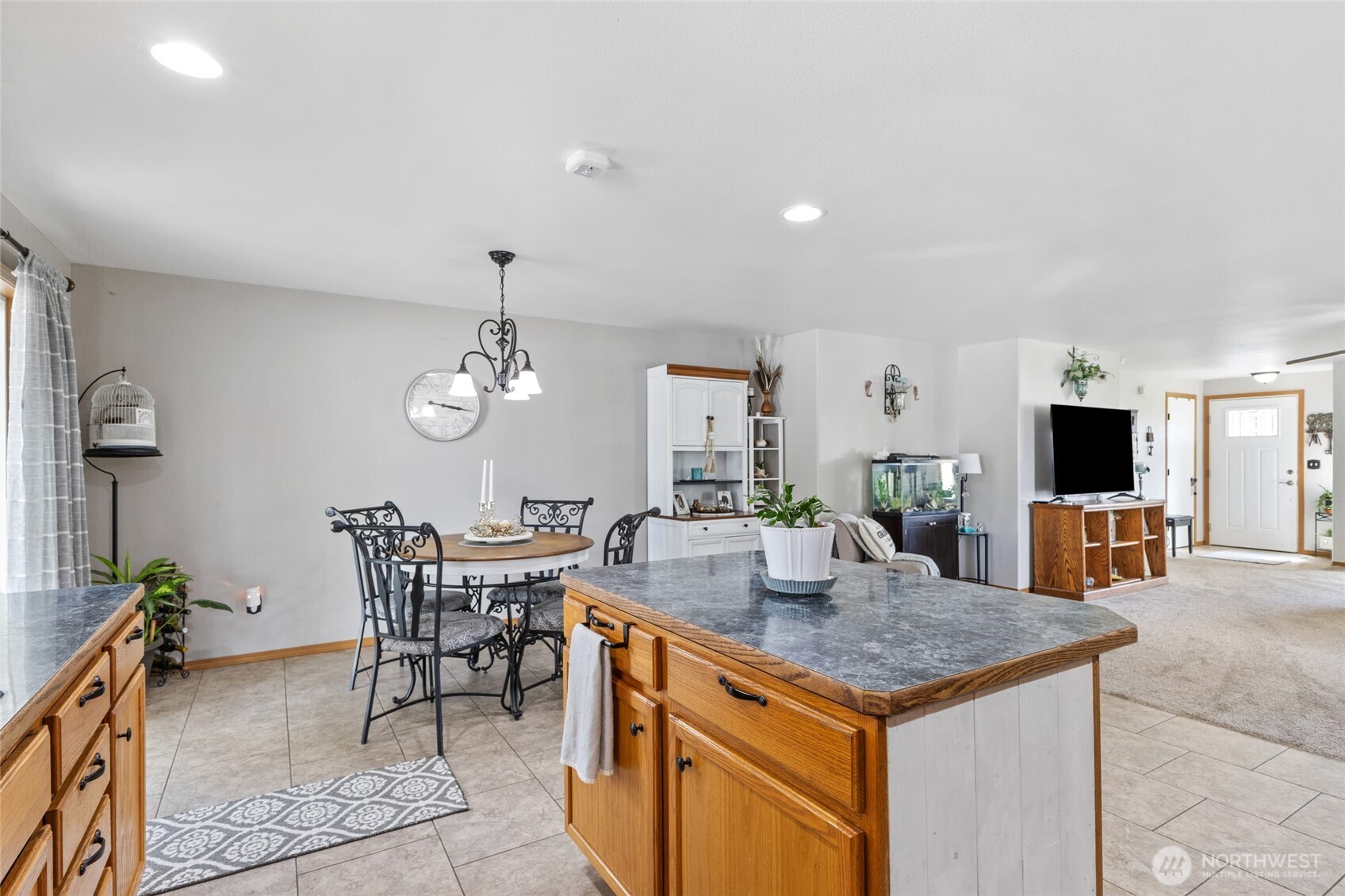 1346 Greens Loop Moses Lake, WA 98837 - Photo 12 of 39 a view of a dining room with furniture