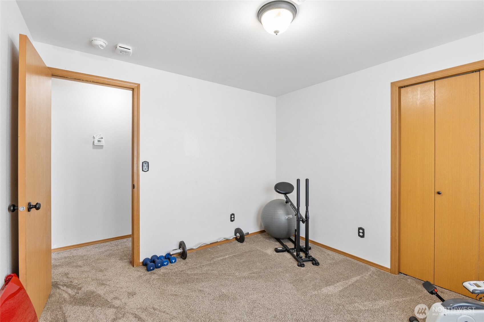 1346 Greens Loop Moses Lake, WA 98837 - Photo 22 of 39 a view of a room with gym equipment