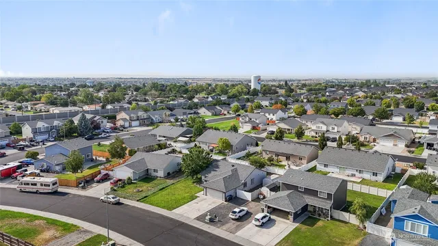 an aerial view of a city with lots of residential buildings