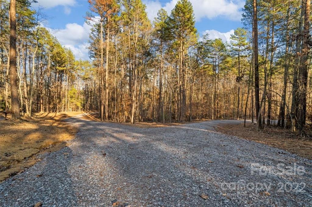0 Shannon Ridge Drive, Unit 1 Gastonia, NC 28056 - Photo 1 of 5 a view of a yard with trees