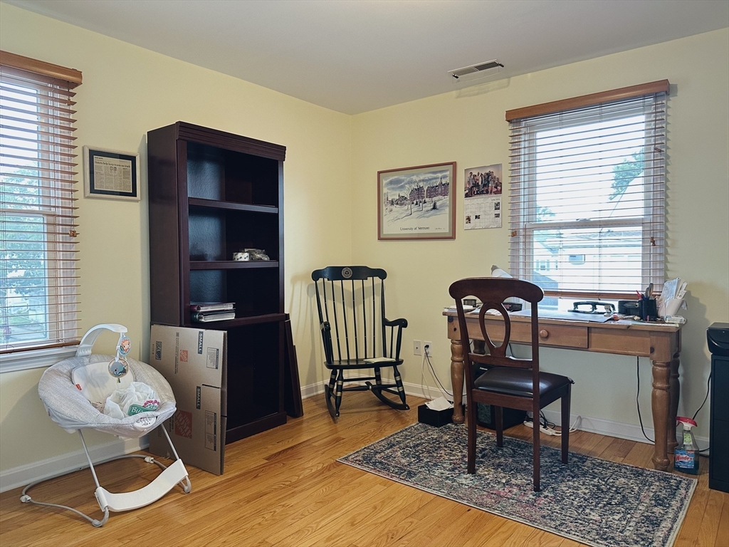 209 Adams Street, Unit B Malden, MA 02148 - Photo 12 of 30 a living room with furniture and a window