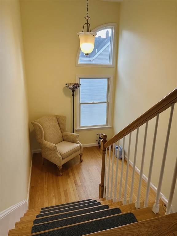 209 Adams Street, Unit B Malden, MA 02148 - Photo 22 of 30 a view of entryway with wooden floor