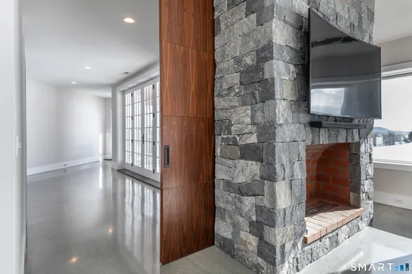 a view of entryway with wooden floor