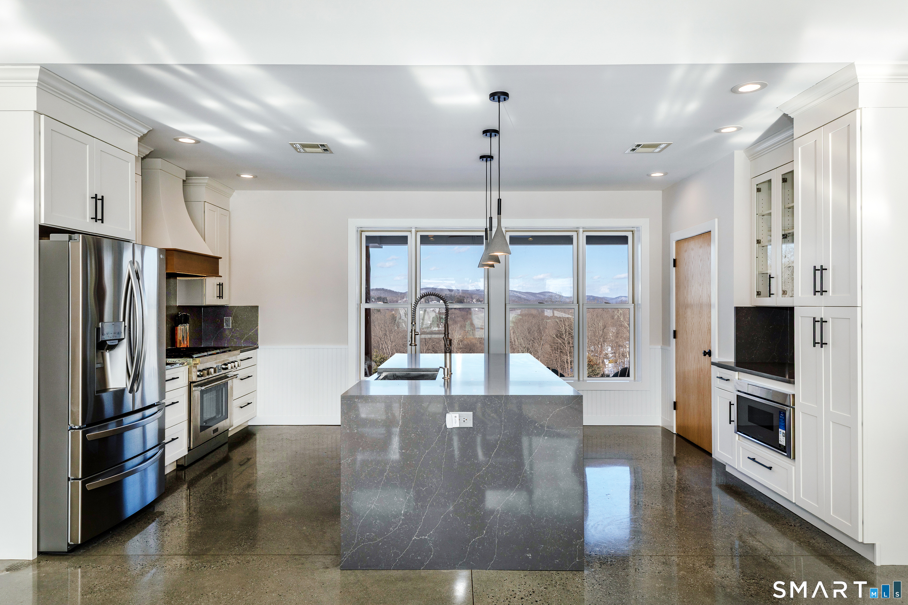 105 Highway 39 Sherman, CT 06784 - Photo 14 of 39 a view of a kitchen with refrigerator and microwave