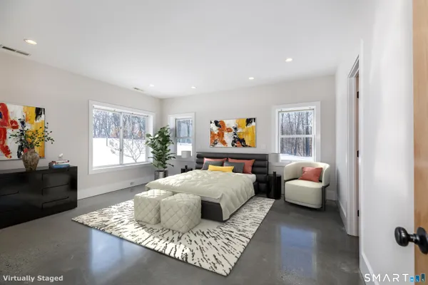 a living room with furniture and a couch