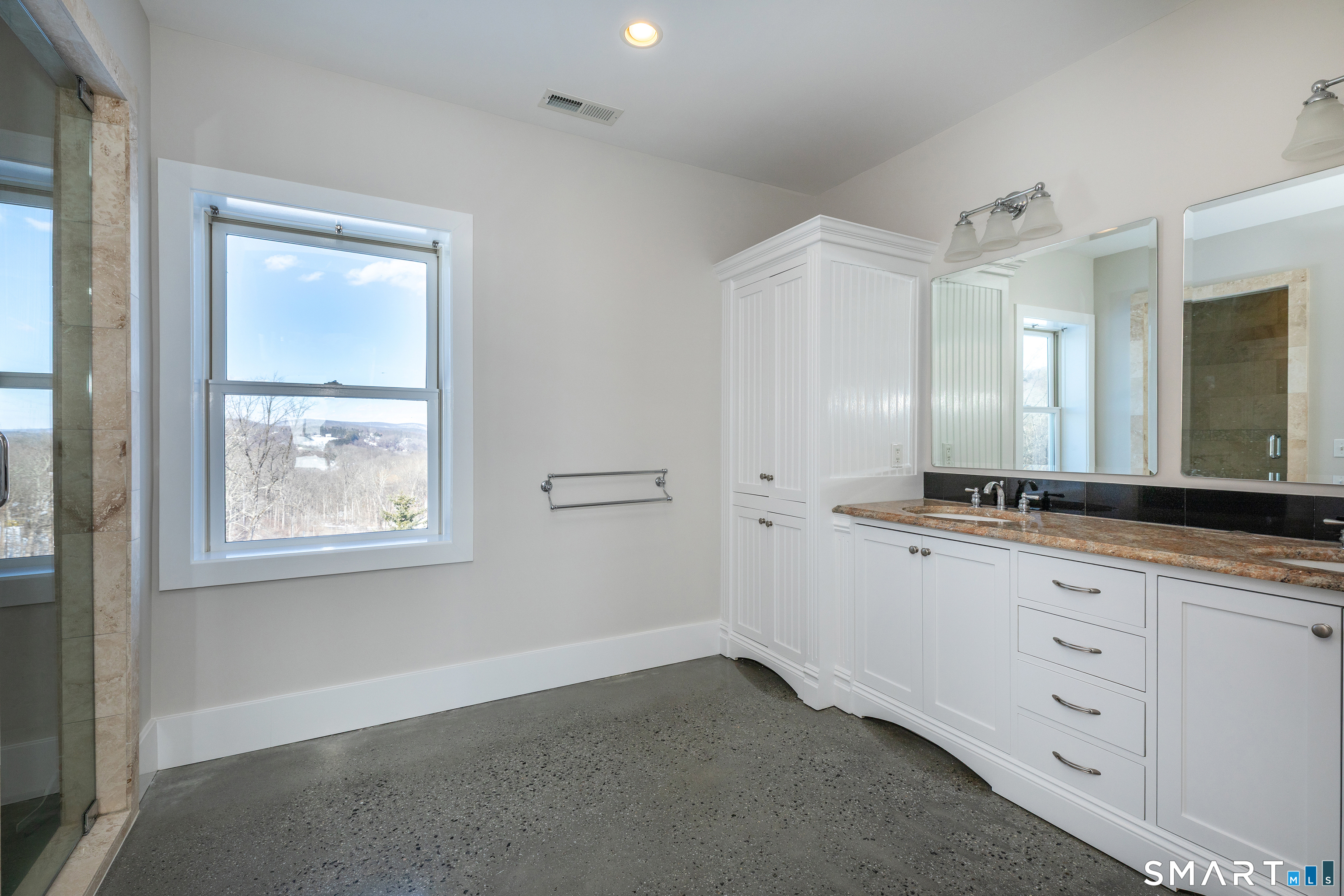 105 Highway 39 Sherman, CT 06784 - Photo 20 of 39 a bathroom with a double vanity sink and a mirror
