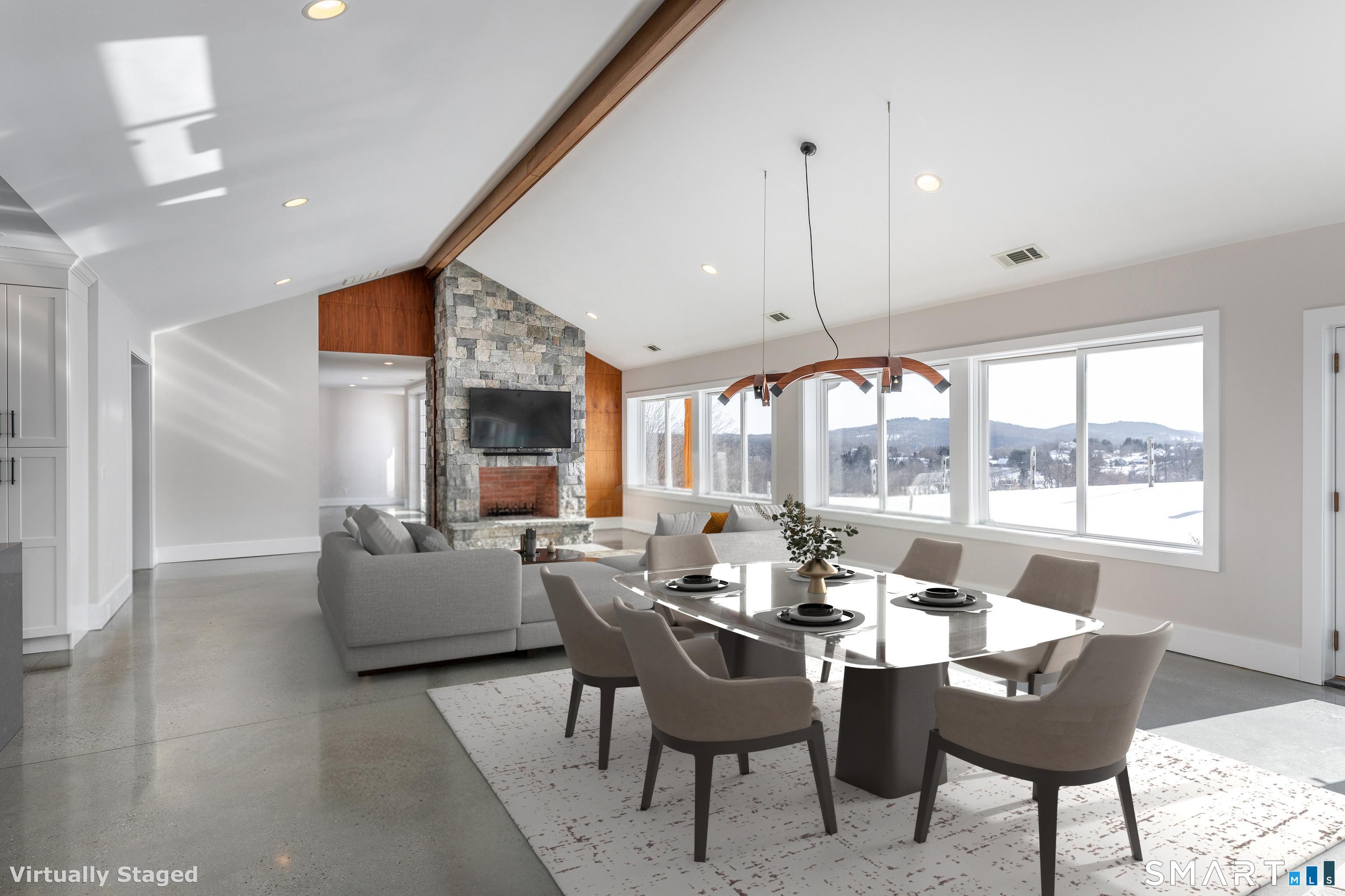 105 Highway 39 Sherman, CT 06784 - Photo 9 of 39 a dining room with furniture a rug and a large window