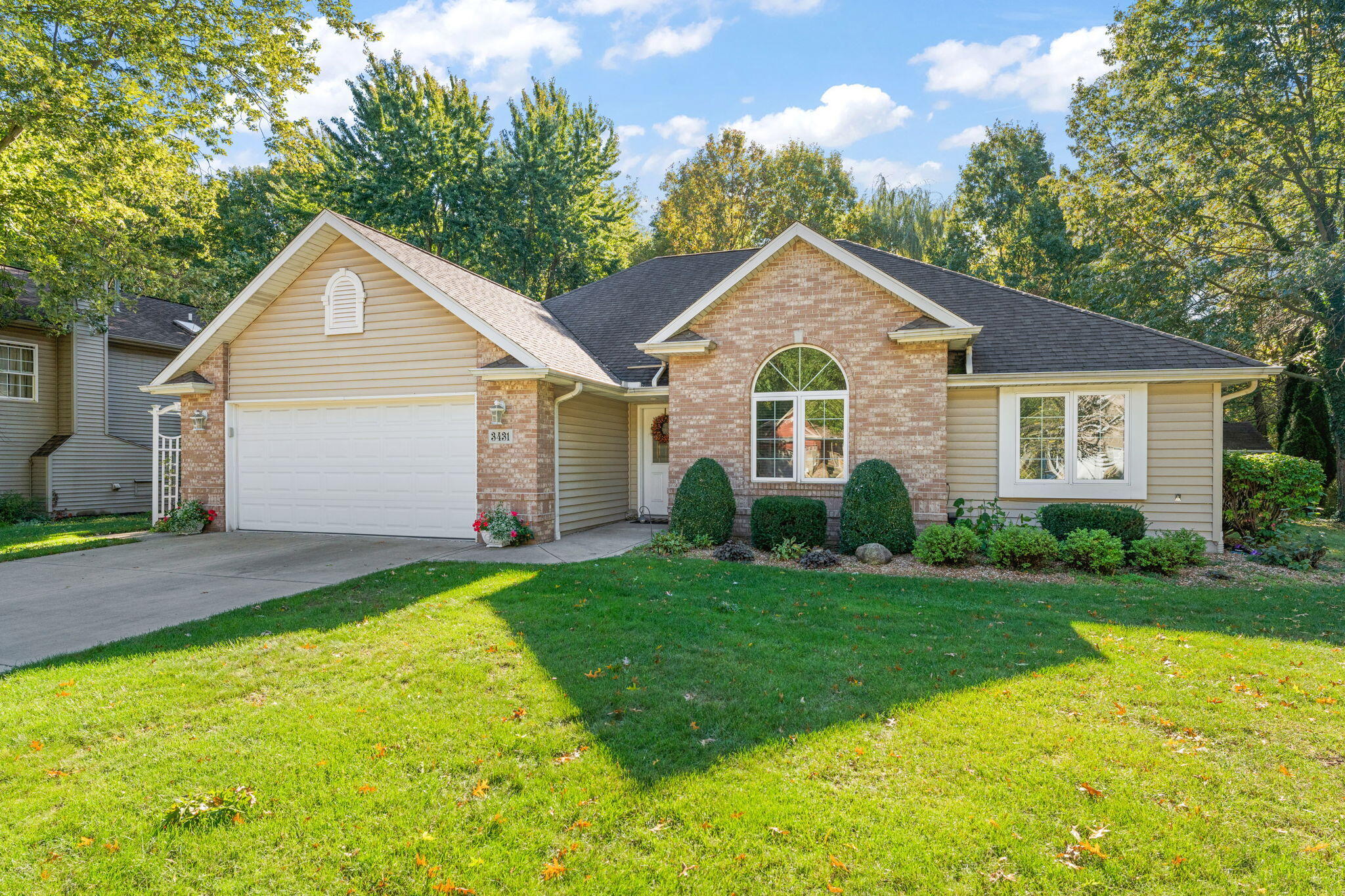 3431 Drivers Way Chesterton, IN 46304 - Photo 2 of 31 a view of a house with a yard and garage