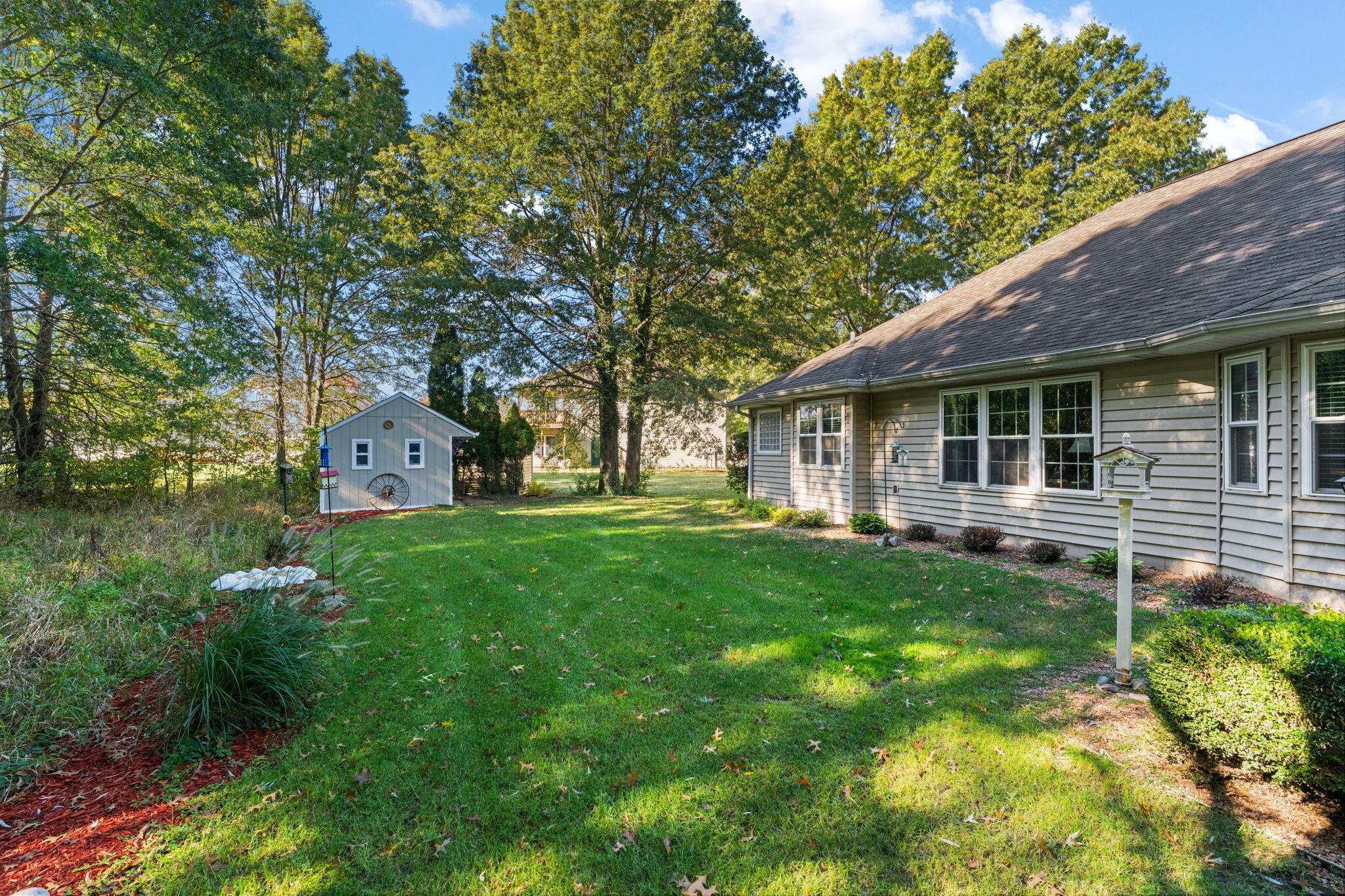 3431 Drivers Way Chesterton, IN 46304 - Photo 21 of 31 a view of a house with backyard and garden