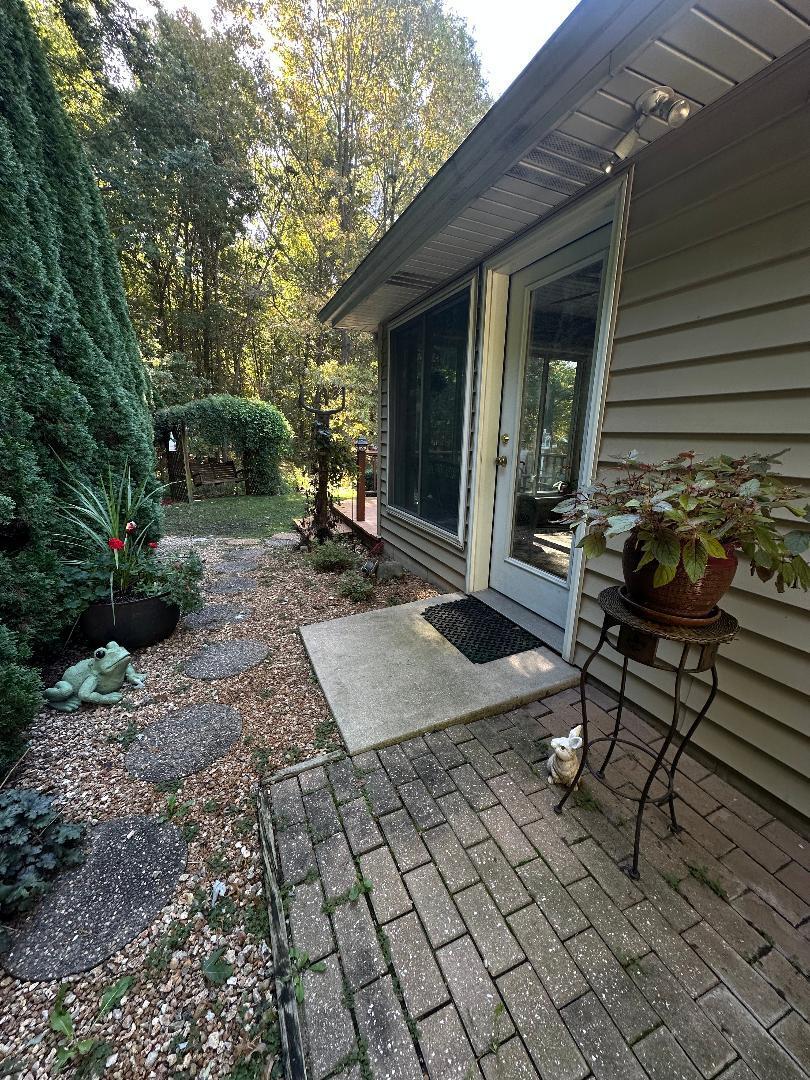 3431 Drivers Way Chesterton, IN 46304 - Photo 23 of 31 a backyard of a house with seating space