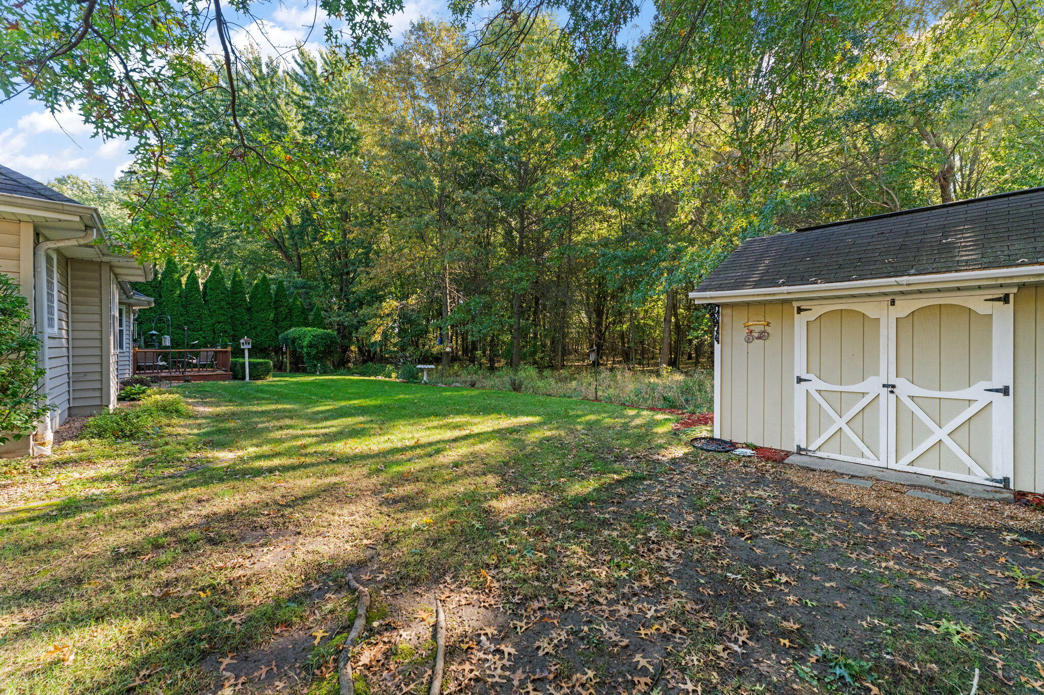 3431 Drivers Way Chesterton, IN 46304 - Photo 27 of 31 a view of a house with backyard and a tree