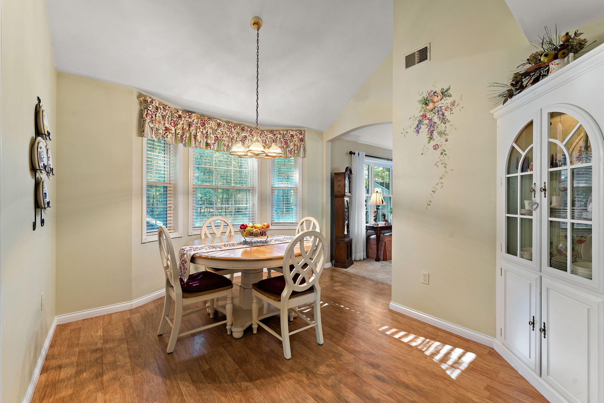3431 Drivers Way Chesterton, IN 46304 - Photo 6 of 31 a view of a dining room with furniture window and wooden floor