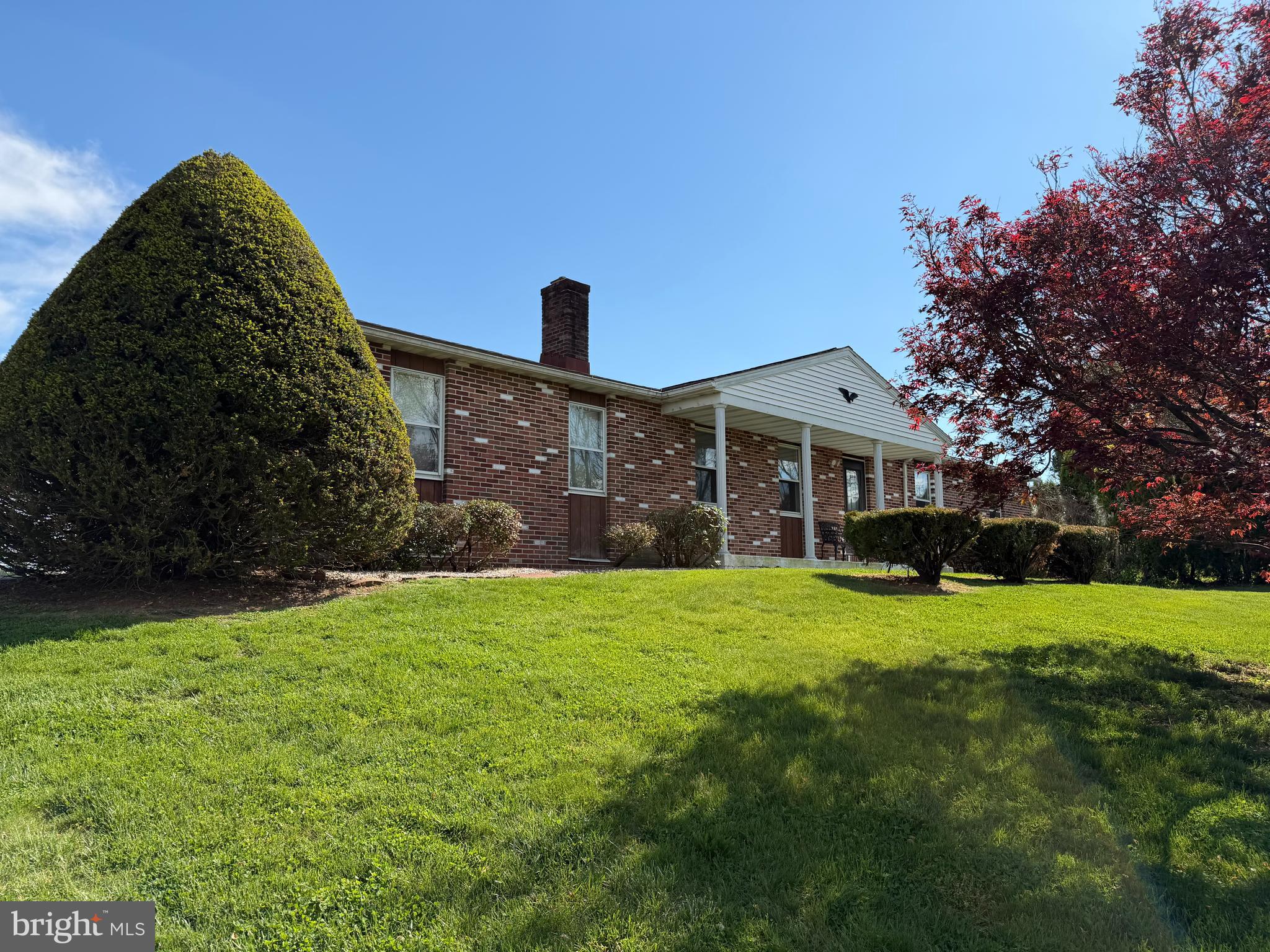 88 Davis Bridge Road Bernville, PA 19506 - Photo 3 of 5 a front view of a house with a yard