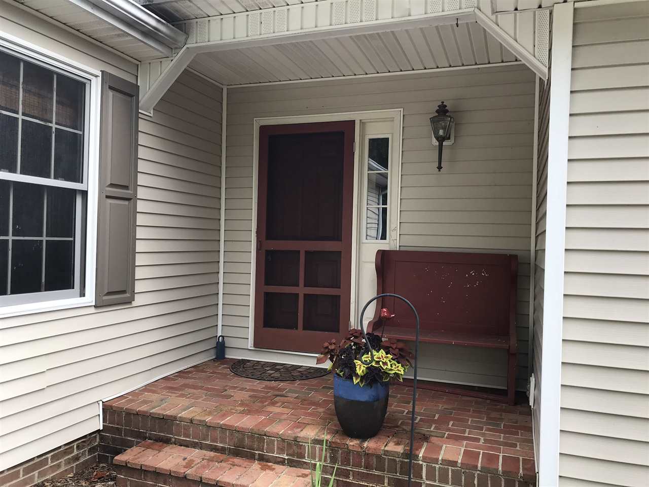15 Lilly Farm Lane Raphine, VA 24472 - Photo 38 of 49 a front view of a house with a potted plant