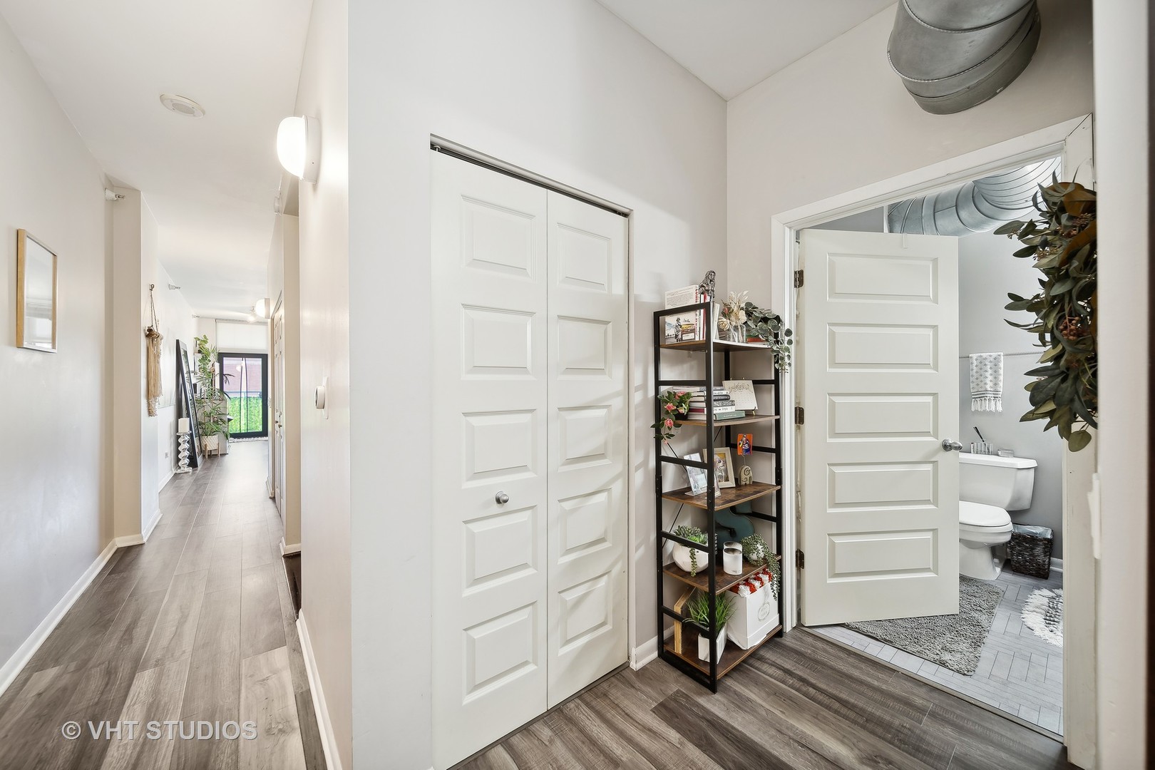 1200 West Monroe Street, Unit 418 Chicago, IL 60607 - Photo 12 of 17 a view of walk in closet with clothes and shoes
