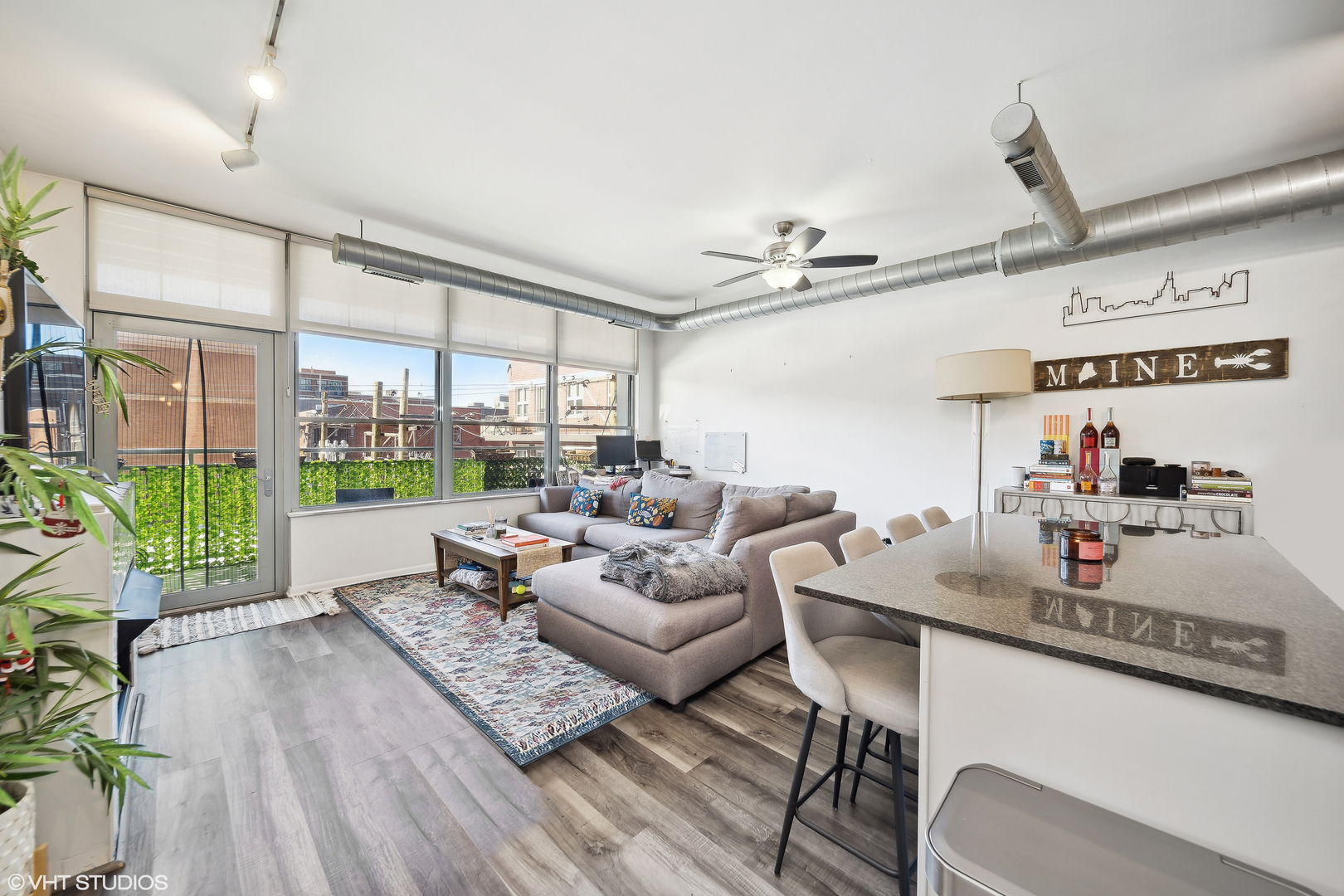 1200 West Monroe Street, Unit 418 Chicago, IL 60607 - Photo 2 of 17 a living room with furniture and a large window