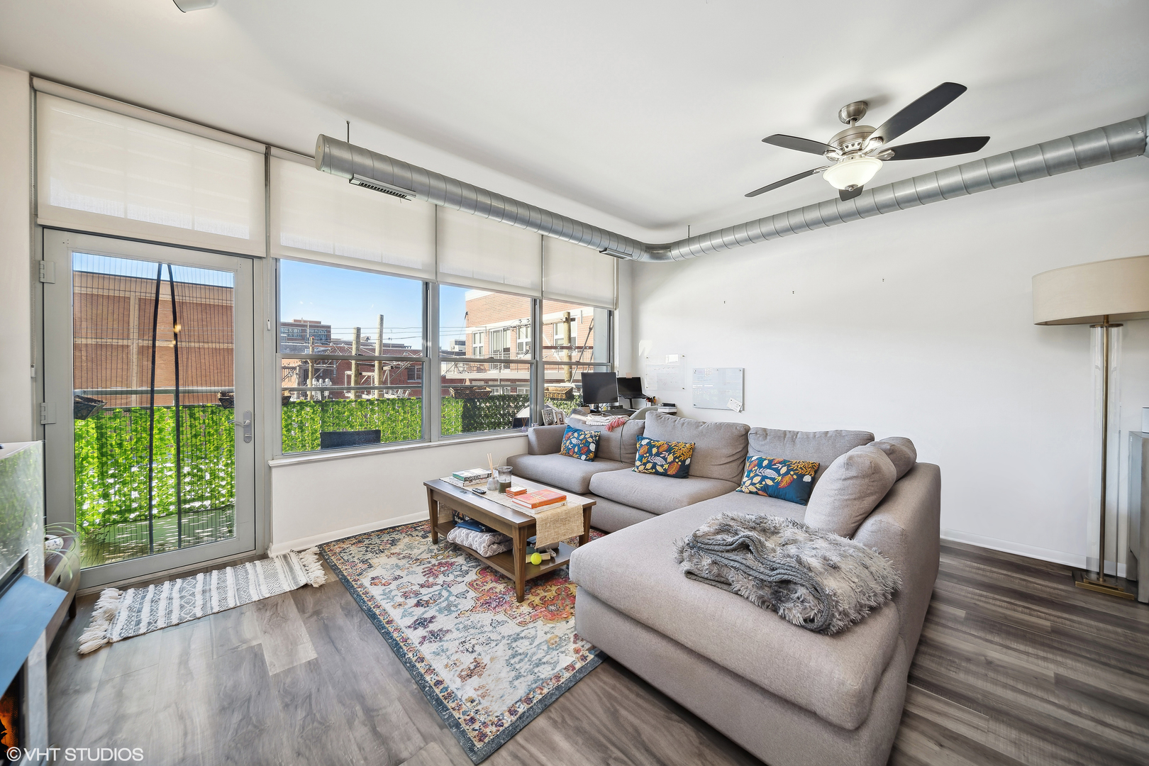 1200 West Monroe Street, Unit 418 Chicago, IL 60607 - Photo 3 of 17 a living room with furniture and a large window