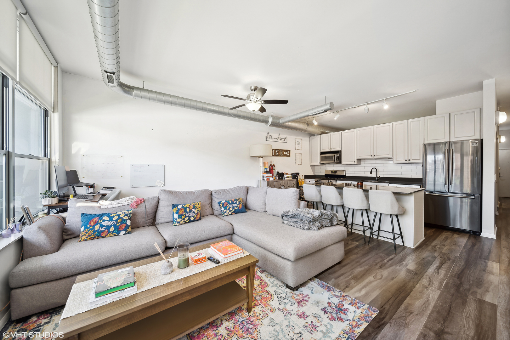 1200 West Monroe Street, Unit 418 Chicago, IL 60607 - Photo 5 of 17 a living room with furniture and kitchen view