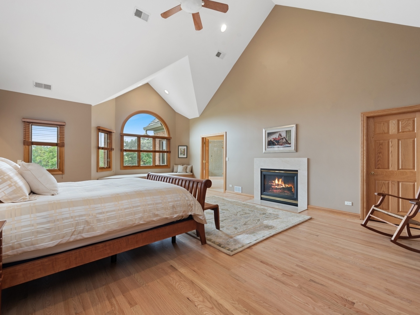 33 Brinker Road Barrington Hills, IL 60010 - Photo 12 of 43 a bedroom with a bed and a fireplace