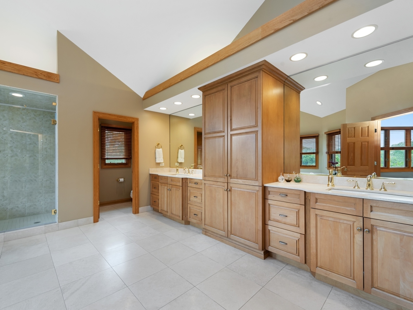 33 Brinker Road Barrington Hills, IL 60010 - Photo 13 of 43 a kitchen with white cabinets and sink