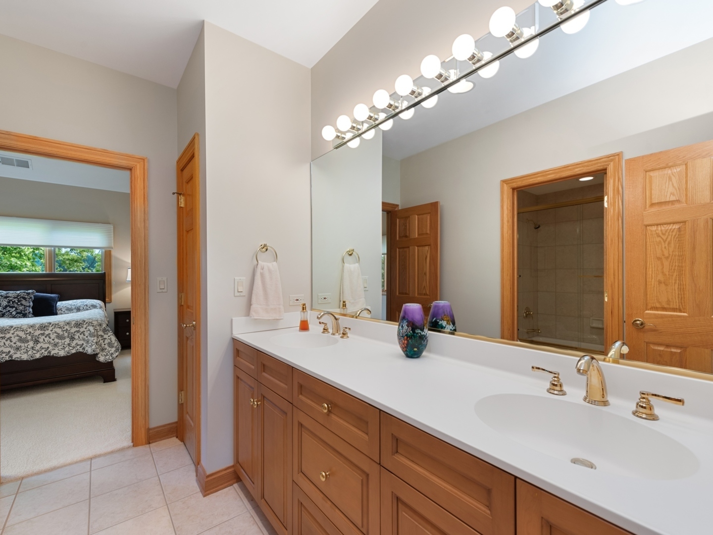 33 Brinker Road Barrington Hills, IL 60010 - Photo 20 of 43 a bathroom with a double vanity sink and a mirror