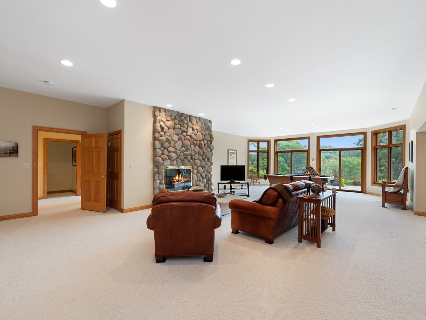 33 Brinker Road Barrington Hills, IL 60010 - Photo 23 of 43 a living room with furniture and large windows