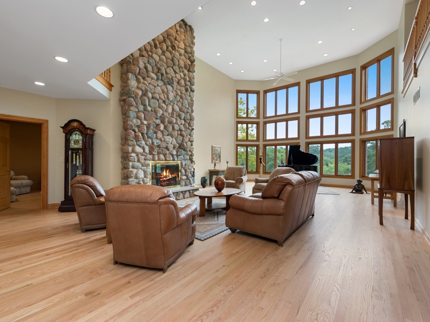 33 Brinker Road Barrington Hills, IL 60010 - Photo 4 of 43 a living room with furniture and a book shelf