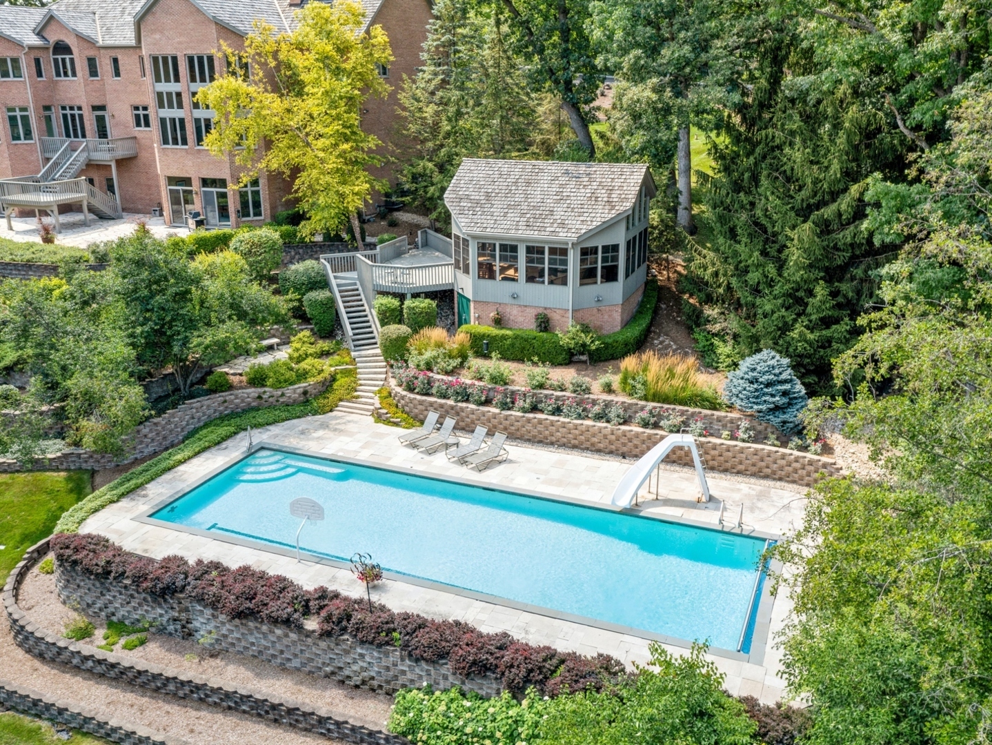 33 Brinker Road Barrington Hills, IL 60010 - Photo 42 of 43 a view of a house with pool and chairs
