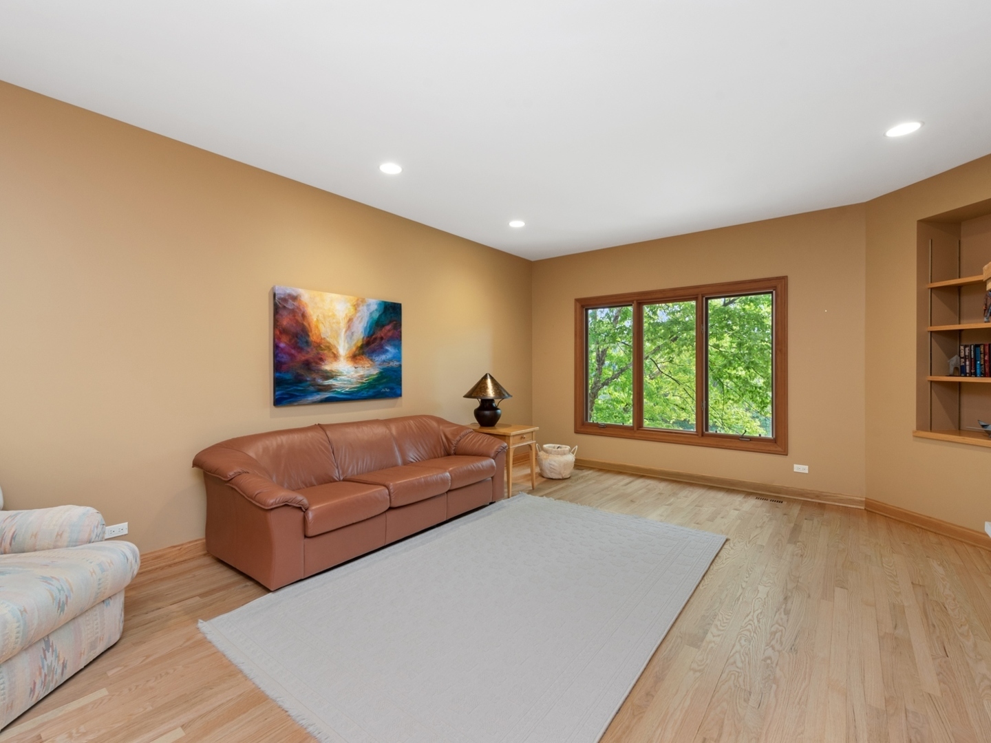 33 Brinker Road Barrington Hills, IL 60010 - Photo 6 of 43 a living room with furniture and a large window