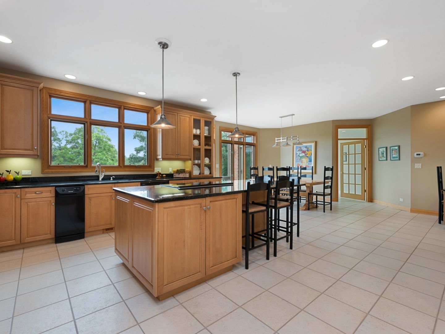 33 Brinker Road Barrington Hills, IL 60010 - Photo 8 of 43 a kitchen with stainless steel appliances granite countertop a stove and a sink